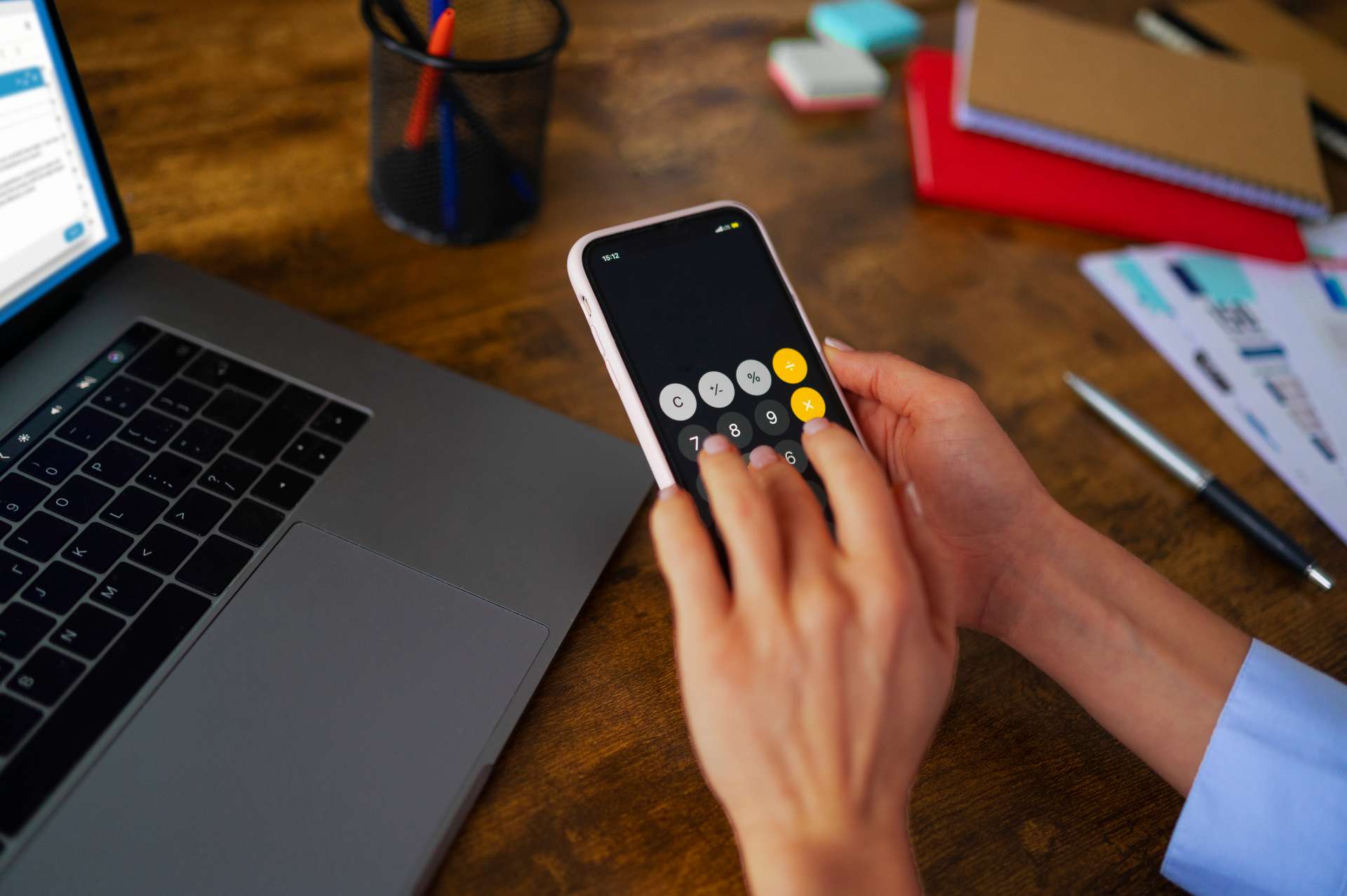 Woman using a calculator